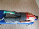 getapter Patient mit Rücken und Unterschenkel Tape